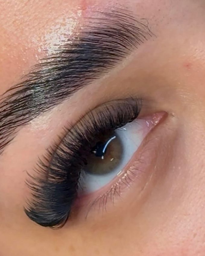 Close-up of laminated brow and voluminous lash extensions