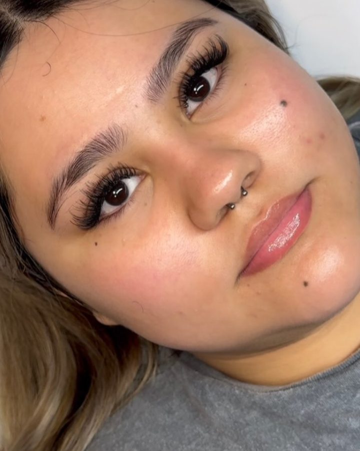 Client with lash extensions and shaped brows
